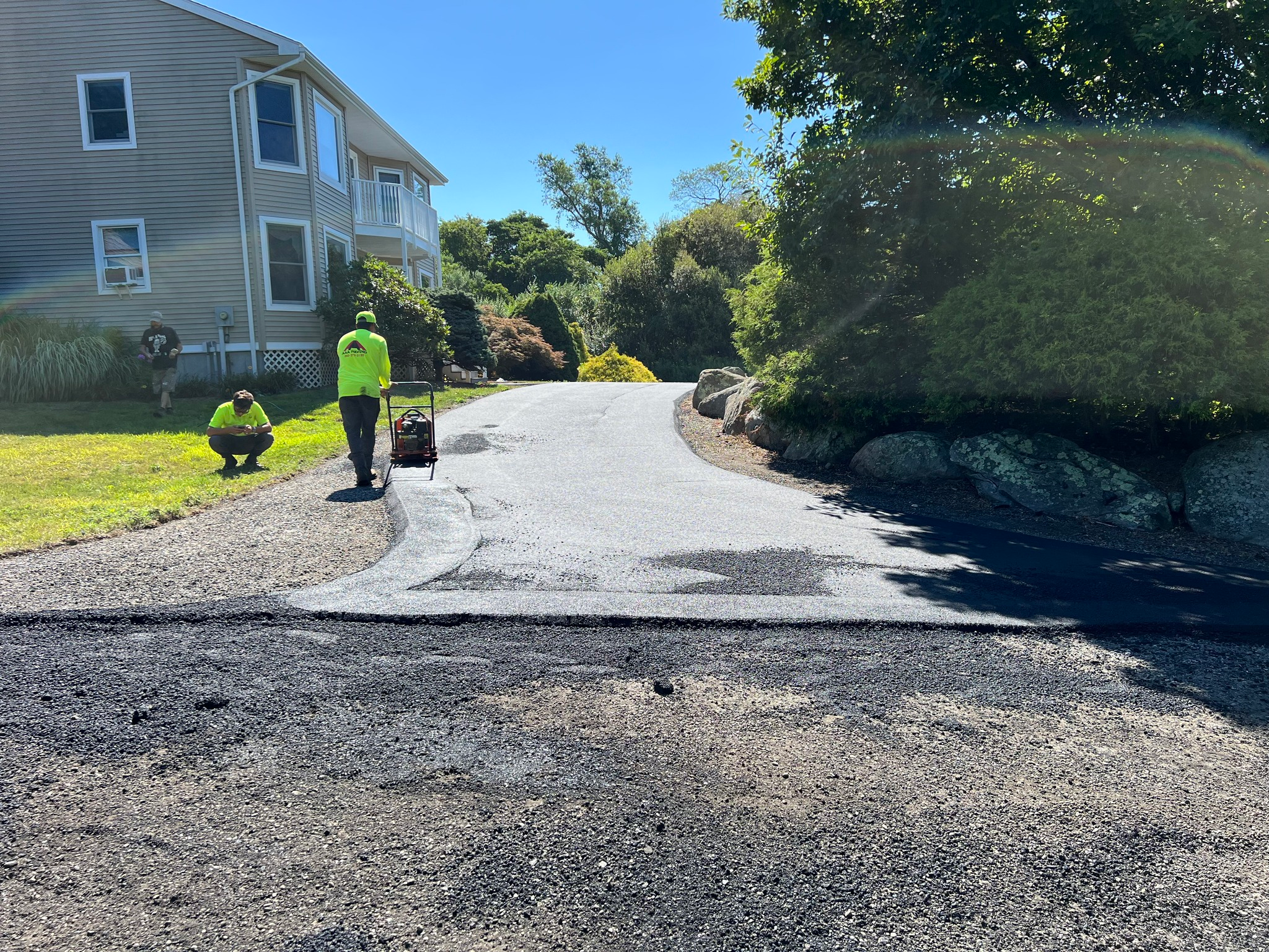 New asphalt driveway installation